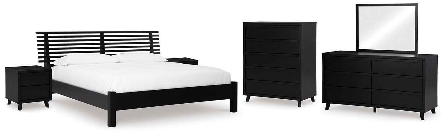 Danziar Queen Panel Bed with Mirrored Dresser, Chest and 2 Nightstands