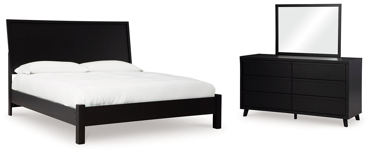 Danziar Queen Panel Bed with Mirrored Dresser