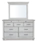 Kanwyn Queen Panel Bed with Storage with Mirrored Dresser and Chest