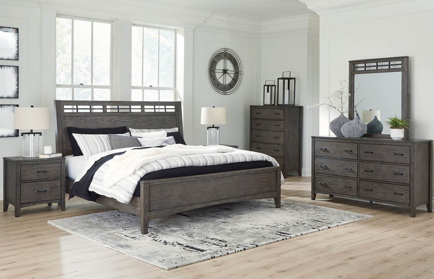 Montillan California King Panel Bed with Mirrored Dresser, Chest and 2 Nightstands